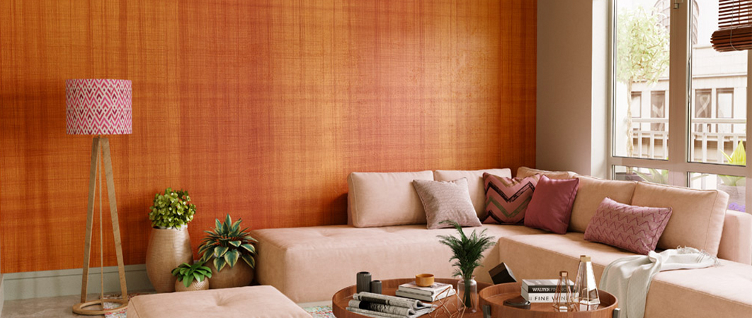 A completely furnished living room decorated with a sofa, coffee